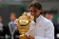 Spain's Rafael Nadal bites the Wimbledon
